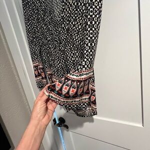 Black and White Patterned Dress with Red Accents